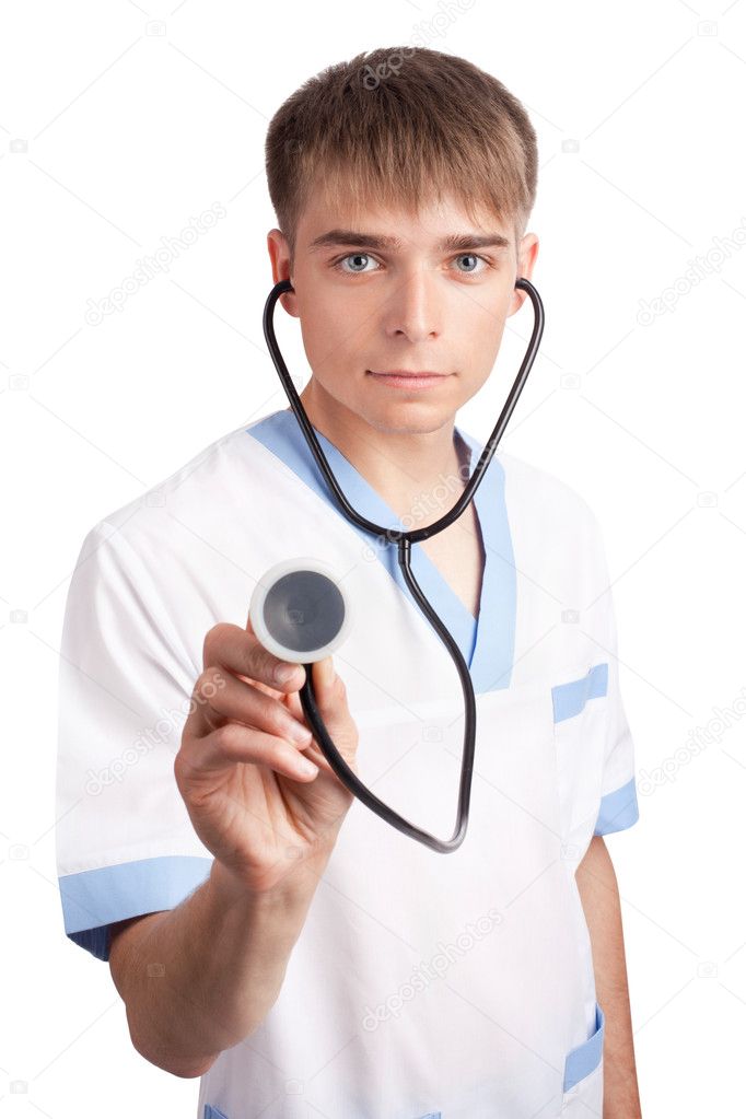 The young medical doctor listens a stethoscope isolated on white