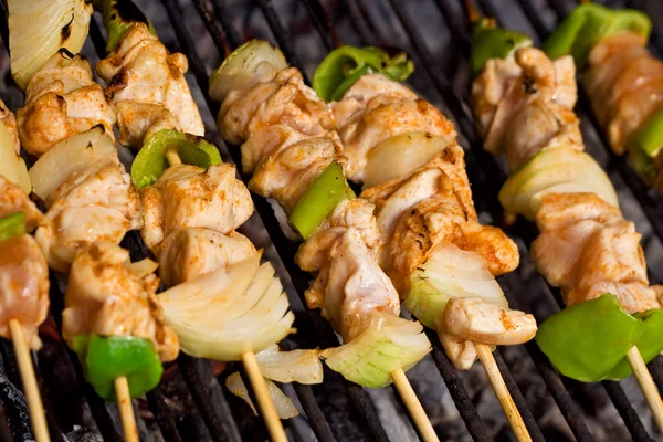 stock image Meat and vegetables on barbecue sticks - closeup