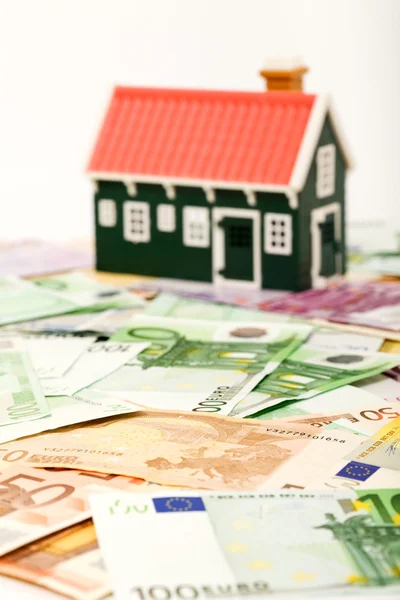 House on money field or foundation — Stock Photo, Image