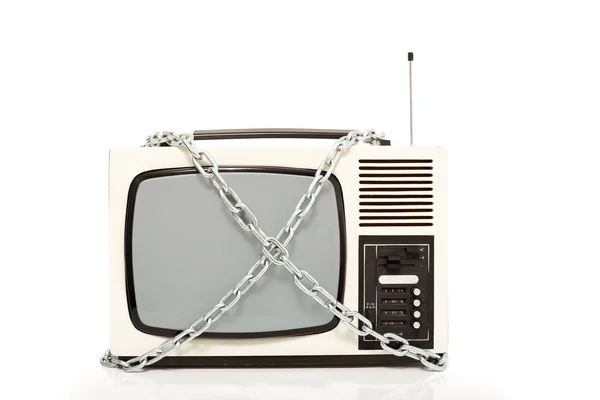 Vintage televisie in ketens — Stockfoto