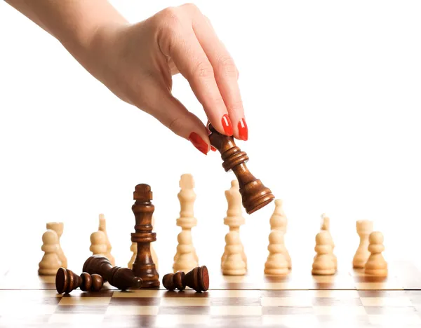 Chess and woman hand — Stock Photo, Image