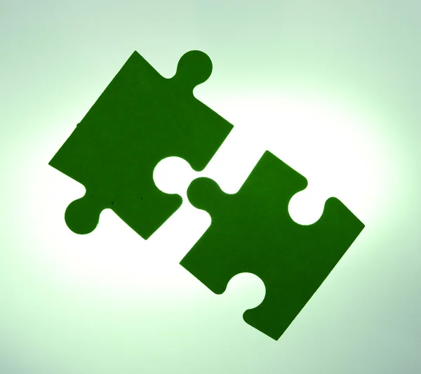 Backlit puzzle pieces - solution concept — Stock Photo, Image
