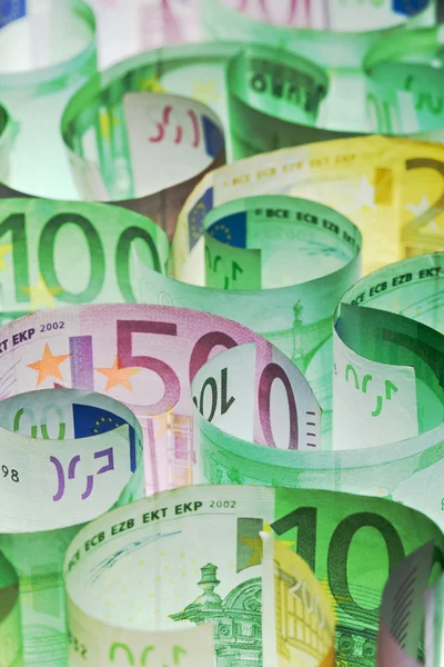Money background - euro banknotes under lit — Stock Photo, Image