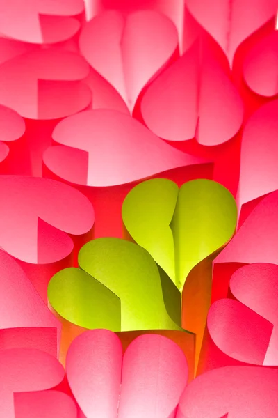 Kağıt kalpleri arka plan - pembe ve yeşil — Stok fotoğraf