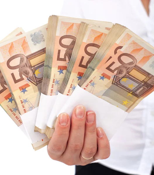 Euro stacks in woman hand — Stock Photo, Image