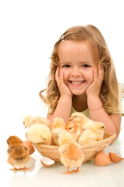 Happy girl with her little chickens clipart