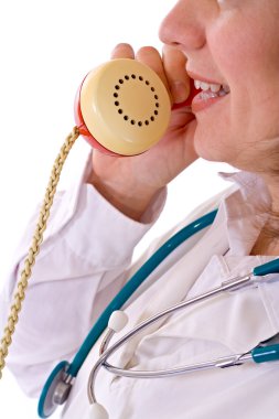 Female doctor on the phone - closeup clipart