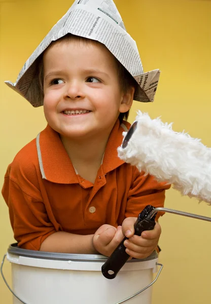 Happy painter with newspaper hat — Stock Photo, Image
