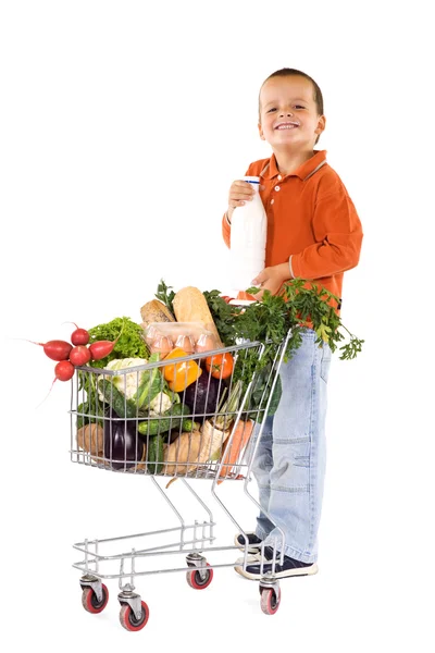 Happy boy with milk and groceries — Stock Photo, Image