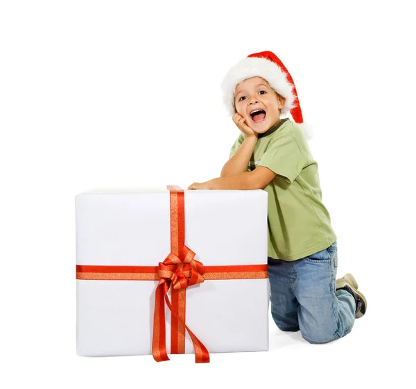Excited boy with large present — Stock Photo, Image