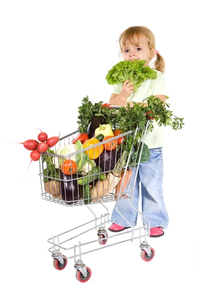 Petite fille shopping légumes — Photo