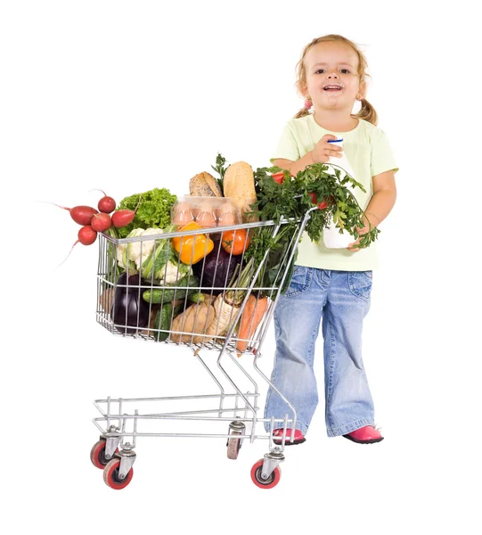 Little girl with groceries — Stock Photo, Image