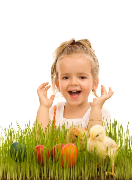 Little girl with easter eggs and baby chickens — Stock Photo, Image