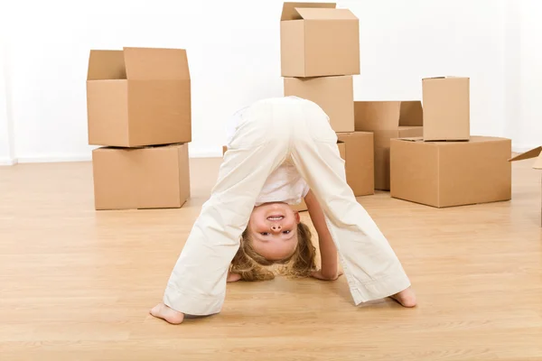 Little girl playing in her new home — Stock Photo, Image