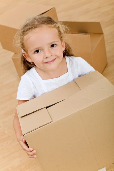 Little girl with cardboard box - closeup — Stock Photo, Image