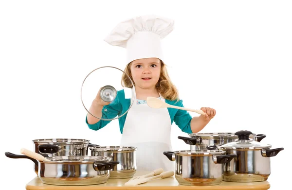 Kislány játszó konyhai edények — Stock Fotó