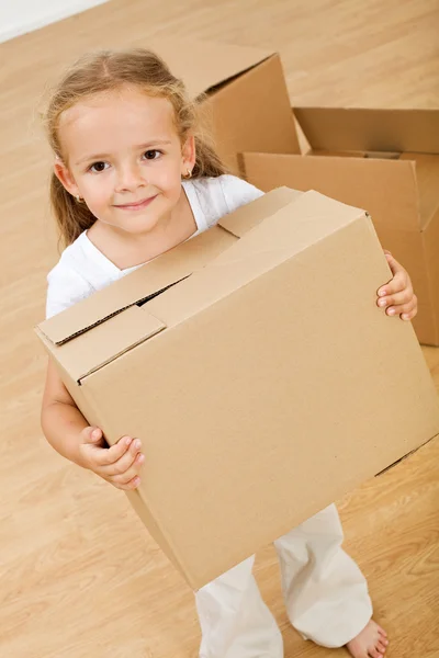 Little girl moving into new house — Stock Photo, Image