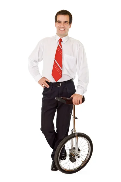 Balance in business - businessman with monocycle — Stock Photo, Image