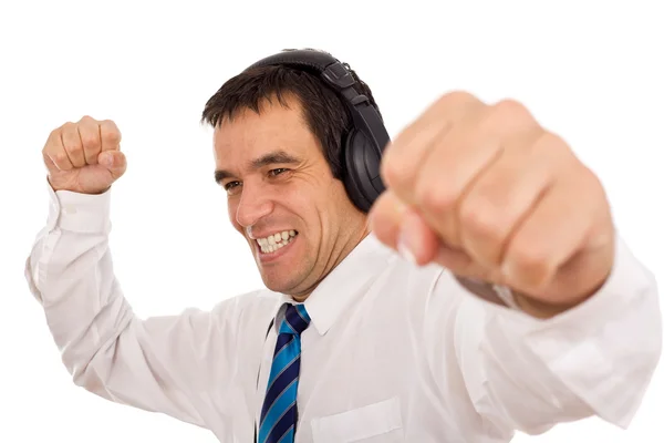 Homme d'affaires libérant le stress en écoutant de la musique — Photo