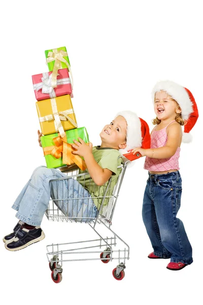 Mutlu çocuklar Noel alışveriş — Stok fotoğraf