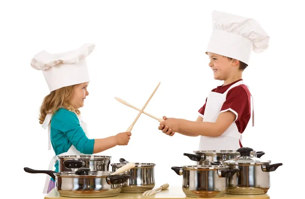 Chefs dual with wooden utensils — Stock Photo, Image