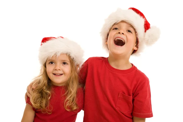 Laughing christmas kids looking aside — Stock Photo, Image