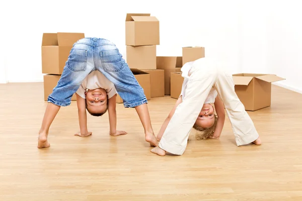 Kids having fun in their new home — Stock Photo, Image