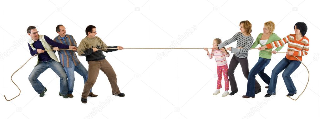 Casual man and woman playing tug of war - isolated on white