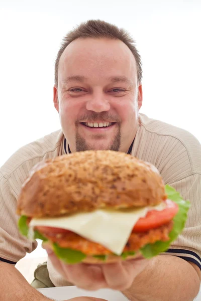 Man happy with the size of his hamburger — Stock Photo, Image