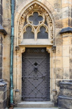 Medieval front door in Prague clipart