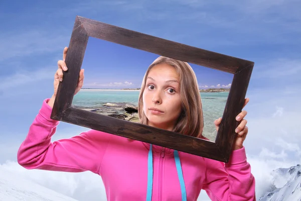 Woman Holding Frame, travel concept — Stock Photo, Image