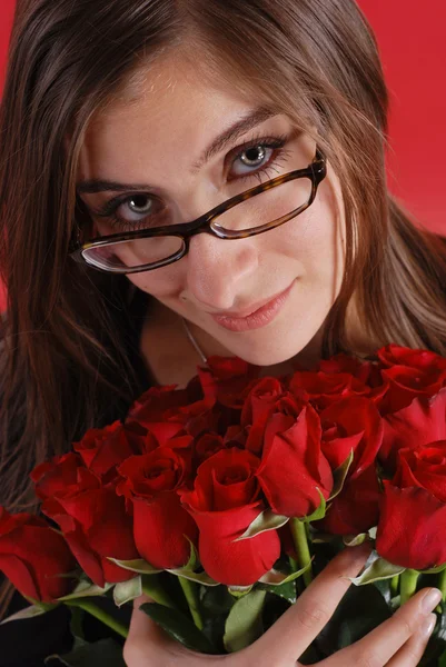 Glasses girl with roses — Stock Photo, Image