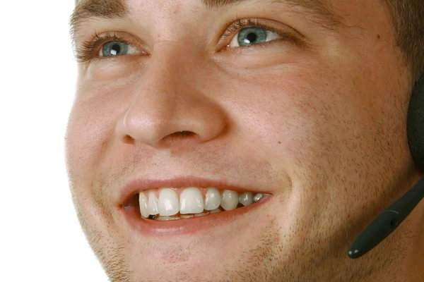 Usmívající se muž s headsetem — Stock fotografie