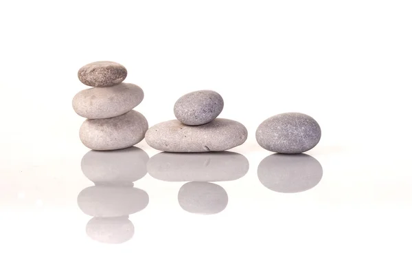 1, 2, 3 pebbles regeling geïsoleerd op wit — Stockfoto