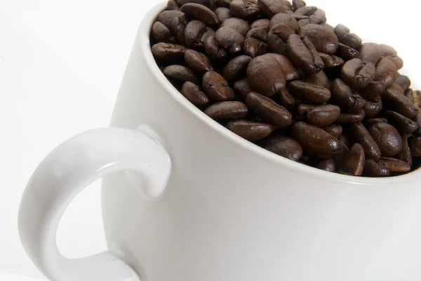 Coffee beans in a cup — Stock Photo, Image