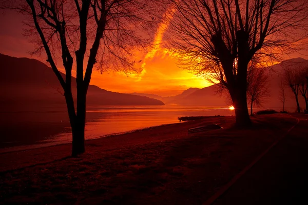 Λίμνη Κόμο στο ηλιοβασίλεμα Royalty Free Εικόνες Αρχείου