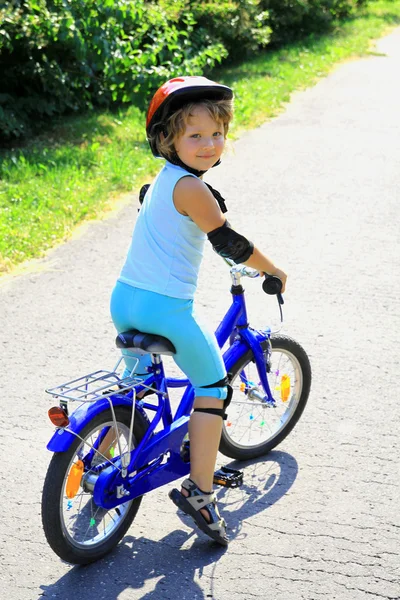 Girl on bike — Stock Photo, Image