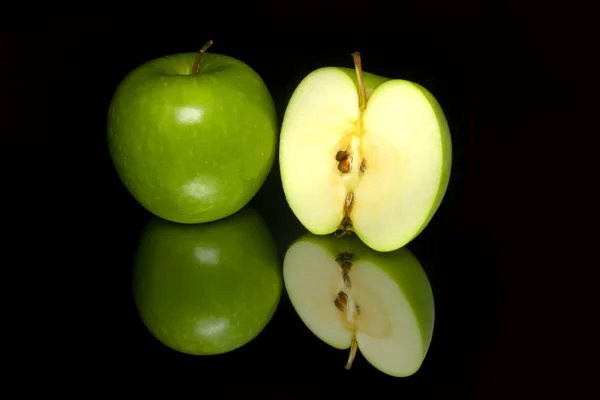 Green apples on the black background — Stock Photo, Image