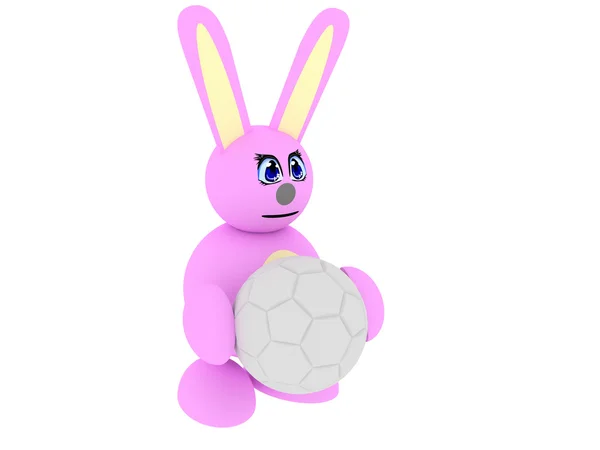 Розовый кролик с футбольным мячом — стоковое фото