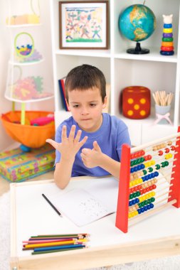 Little boy preparing for elementary school clipart