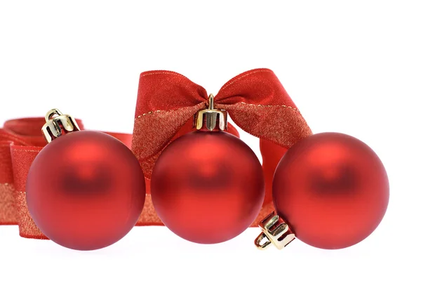Red christmas balls and ribbon — Stock Photo, Image