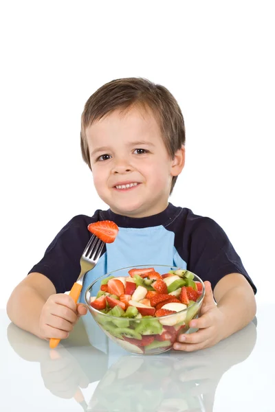 Junge mit Obstsalat — Stockfoto