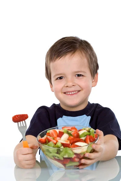Chlapec s ovocným salátem — Stock fotografie