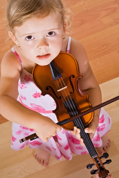 Little girl with a violin - top view — Stock Photo, Image