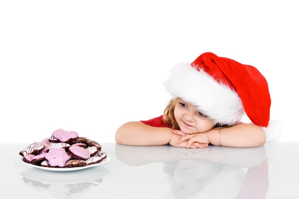 Malá holčička v době Vánoc s cookies — Stock fotografie