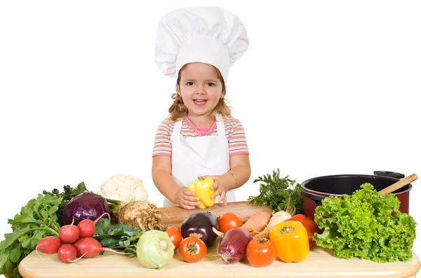 Pequeno chef feliz com legumes — Fotografia de Stock