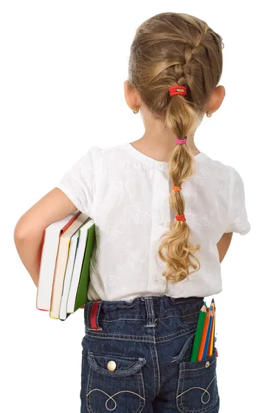 Маленька дівчинка повертається до школи — стокове фото