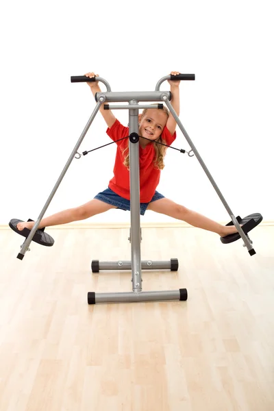 Little girl in the gym having fun — Stock Photo, Image
