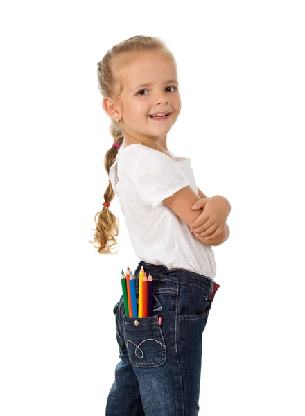 Lite stolt tjej med pennor i fickan — Stockfoto