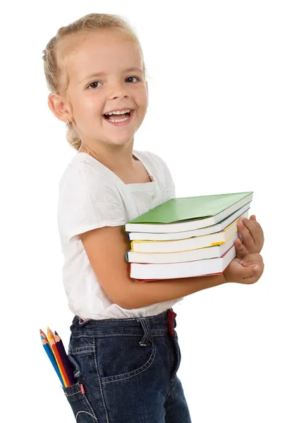 Ragazzina felice con libri scolastici e matite colorate — Foto Stock
